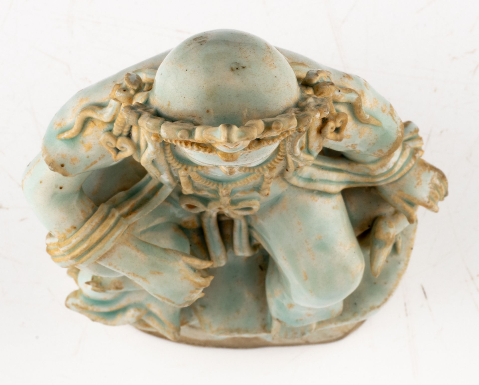 A Chinese famille rose figure of a young Buddha, seated on a lotus base; added a Chinese celadon - Image 6 of 13