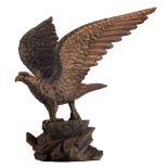 No visible signature, a Japanese golden eagle ready to attack, stained and patinated limewood, H