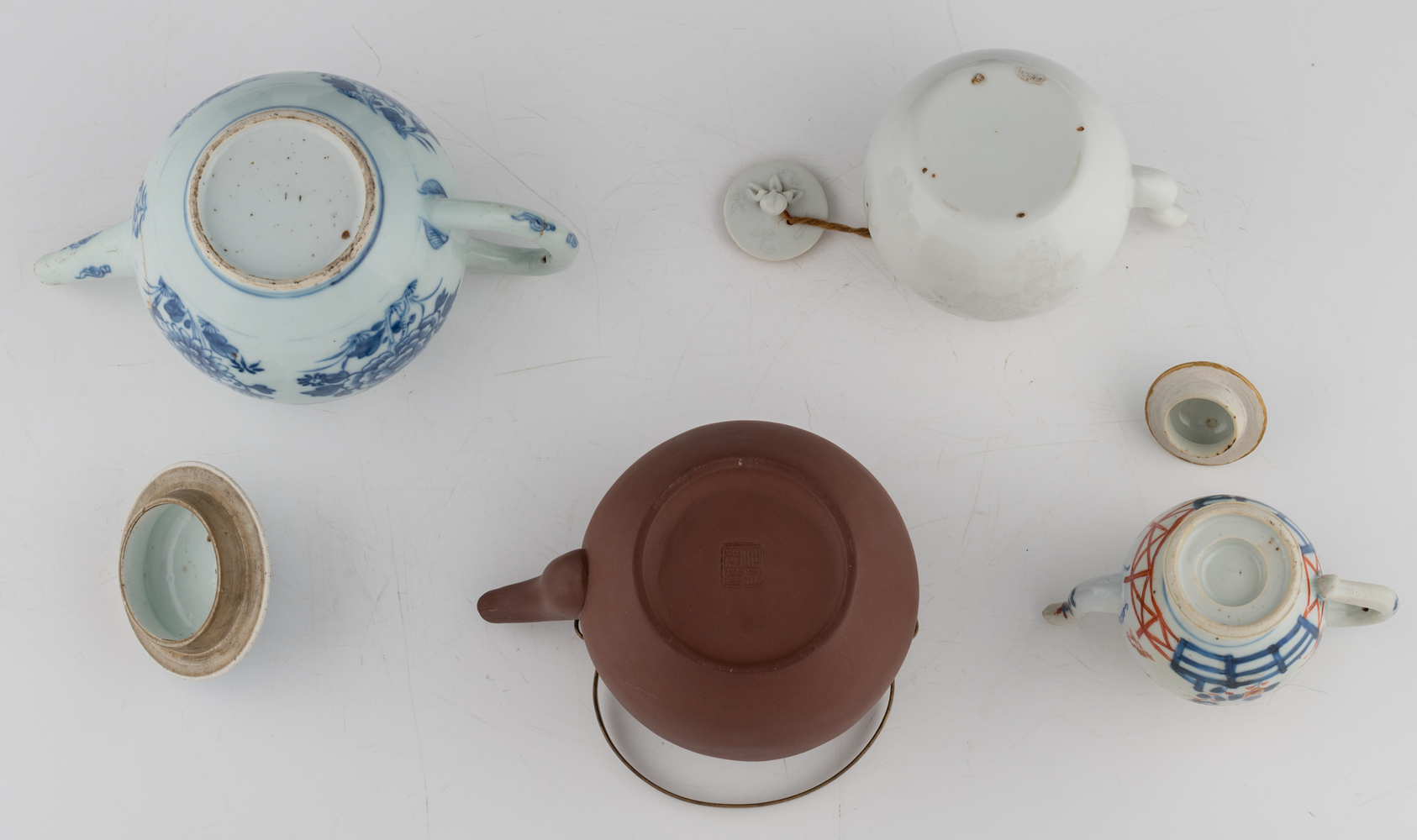 Three Chinese blue and white, Imari and white glazed tea pots and covers, 18th and 19thC; added a - Image 6 of 6