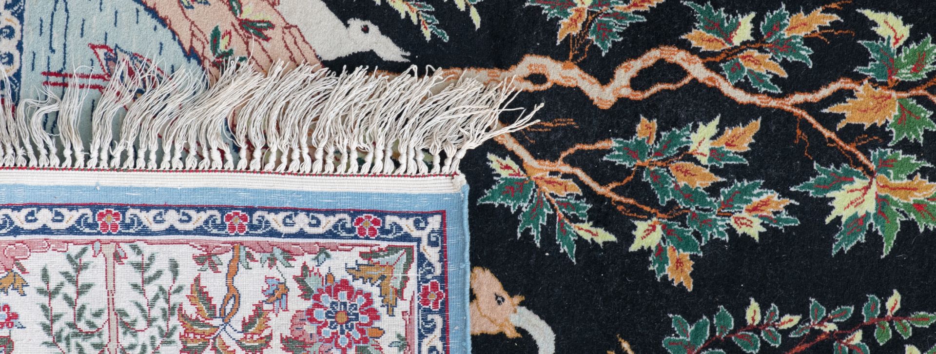 Two Oriental wool and silk carpets, floral decorated with animals, Isfahan, 70 x 98 and 77 x 112 cm - Image 4 of 4