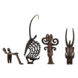 Four decorative African wooden items, different regions and tribes: a chair, a polychrome