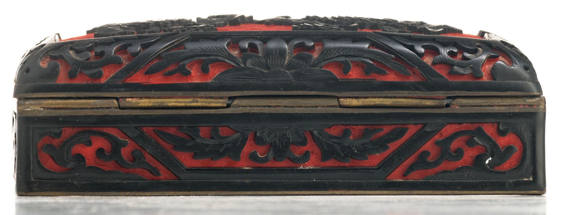 A late 19th / early 20thC Chinese red an black lacquered box and cover, H 5 - W 5 - D 10 cm - Image 4 of 8