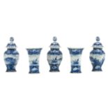 A 19thC Dutch Delftware blue and white five-piece garniture decorated with harbor views, marked