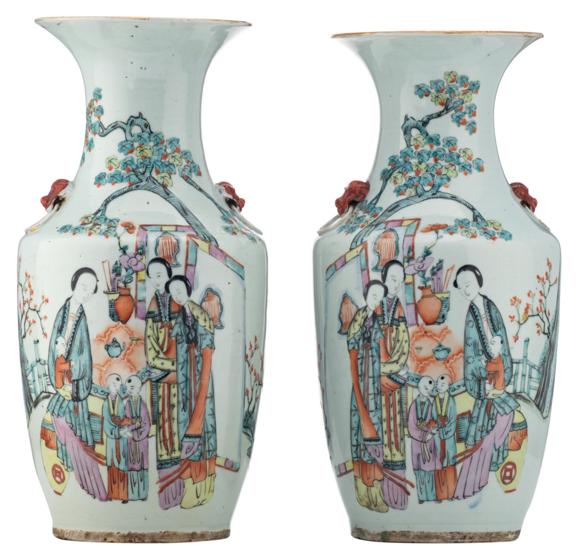 A pair of Chinese polychrome vases, decorated with ladies and children in a garden, and calligraphic