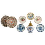 A pair of polychrome decorated Dutch Delftware plates, a North-French 18thC tobacco jar, two