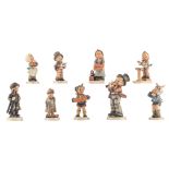 Nine Goebel and Hummel boy figurines, mainly depicting professions, 1951-1973, H 12,5 - 17,5 cm