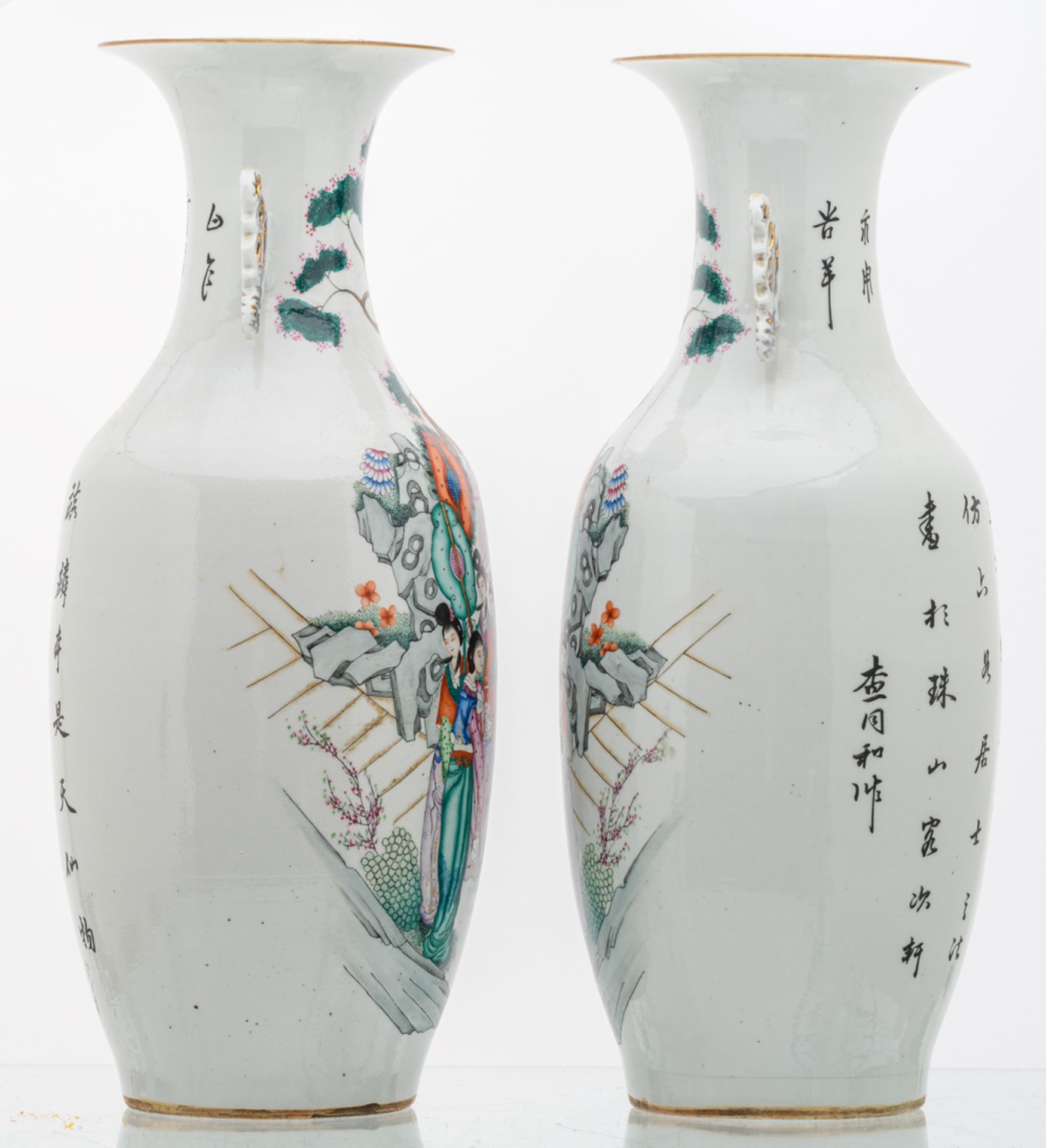 A pair of Chinese famille rose vases, decorated with figures in a cortege and calligraphic texts, - Image 2 of 6