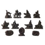 A set of the Eight Immortals, China, cast bronze, 19thC; added three ditto figures, depicting