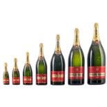 A set of seven Piper Heidsick champagne brut display bottles, fillette size to Balthazar