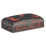 A late 19th / early 20thC Chinese red an black lacquered box and cover, H 5 - W 5 - D 10 cm