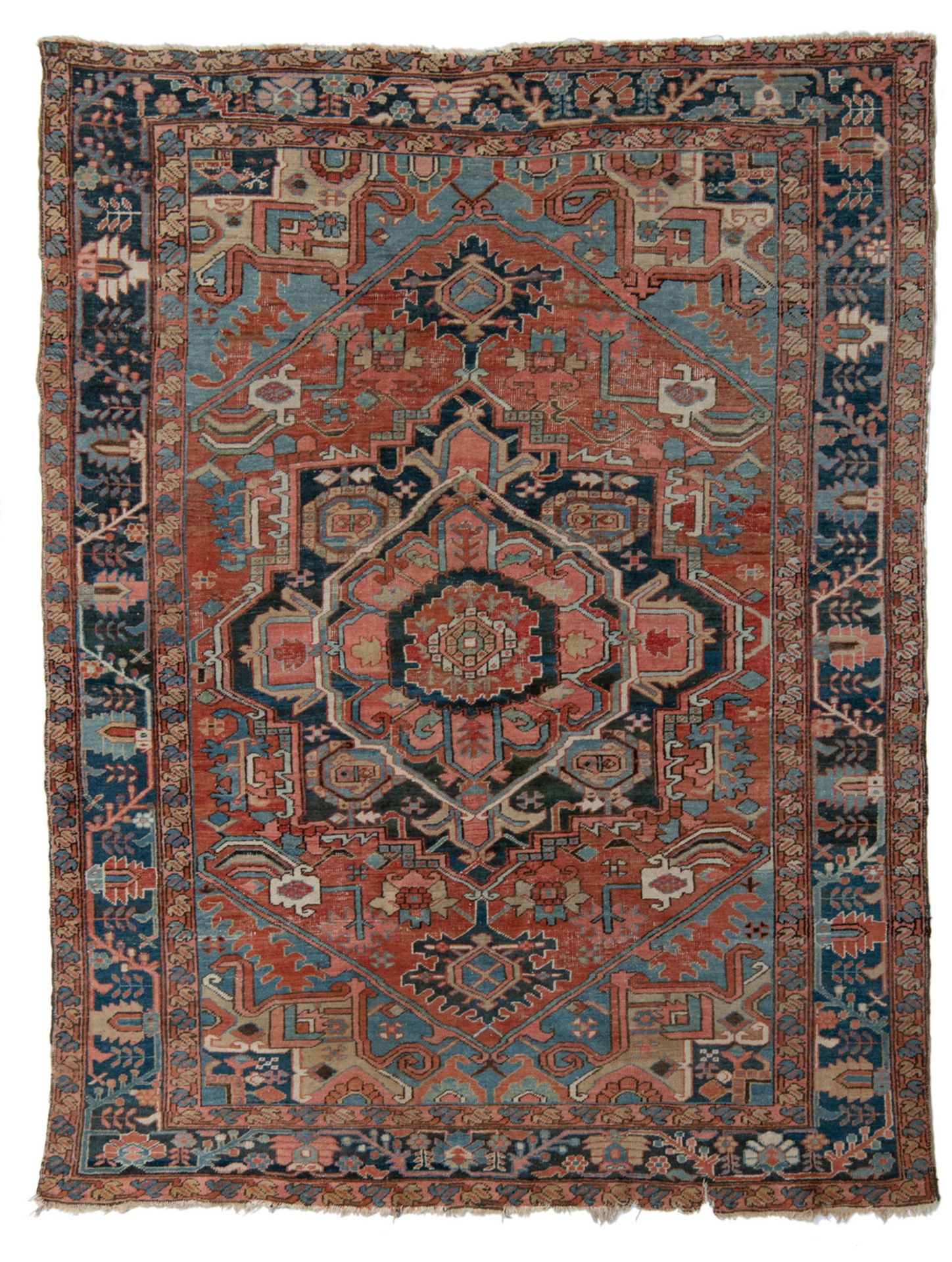 An Oriental rug with stylized floral motifs, wool on cotton, Heriz, 234 x 306 cm