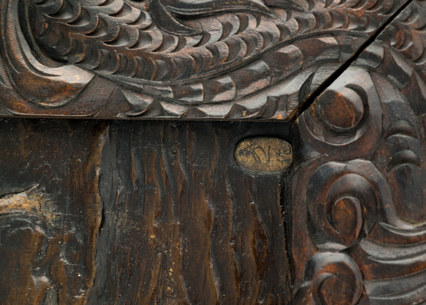 A Japanese alto relievo patinated bronze plaque, depicting fishermen with mount Fuji on the - Image 3 of 3