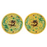 A Chinese yellow ground green and aubergine decorated dragon dish, with a Kangxi mark, H 4,5 - ø