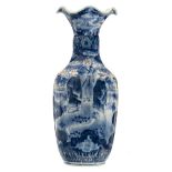 A Japanese blue and white, iron red and gilt decorated vase with savants and birds in a landscape, H