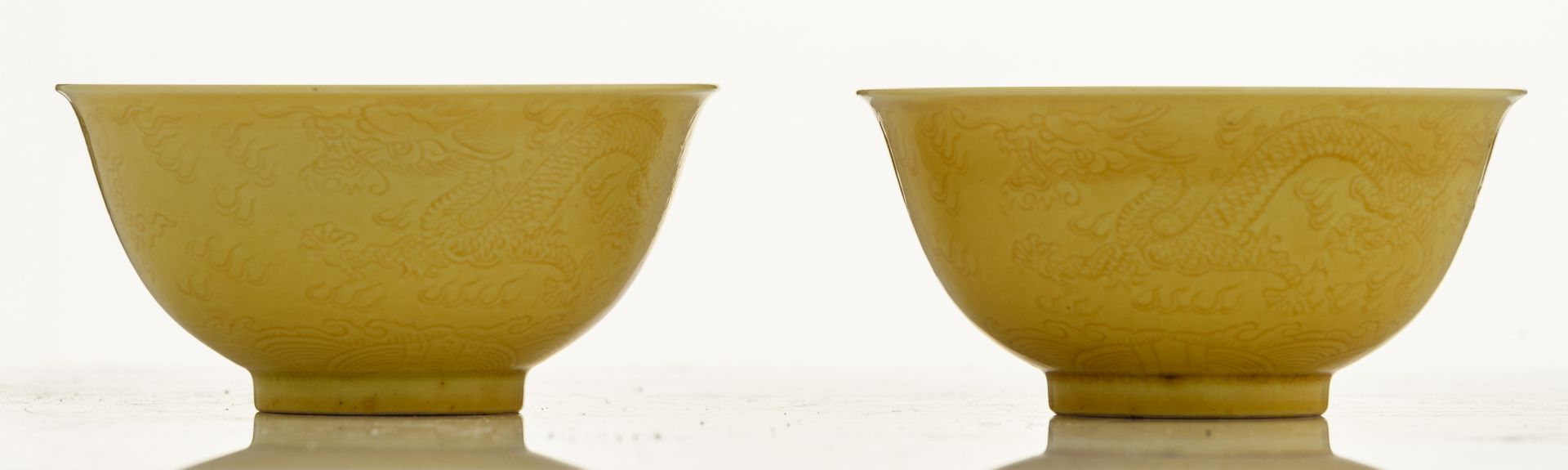 A pair of Chinese yellow glazed imperial bowls, with incised dragons on the outside, marked - Image 5 of 8