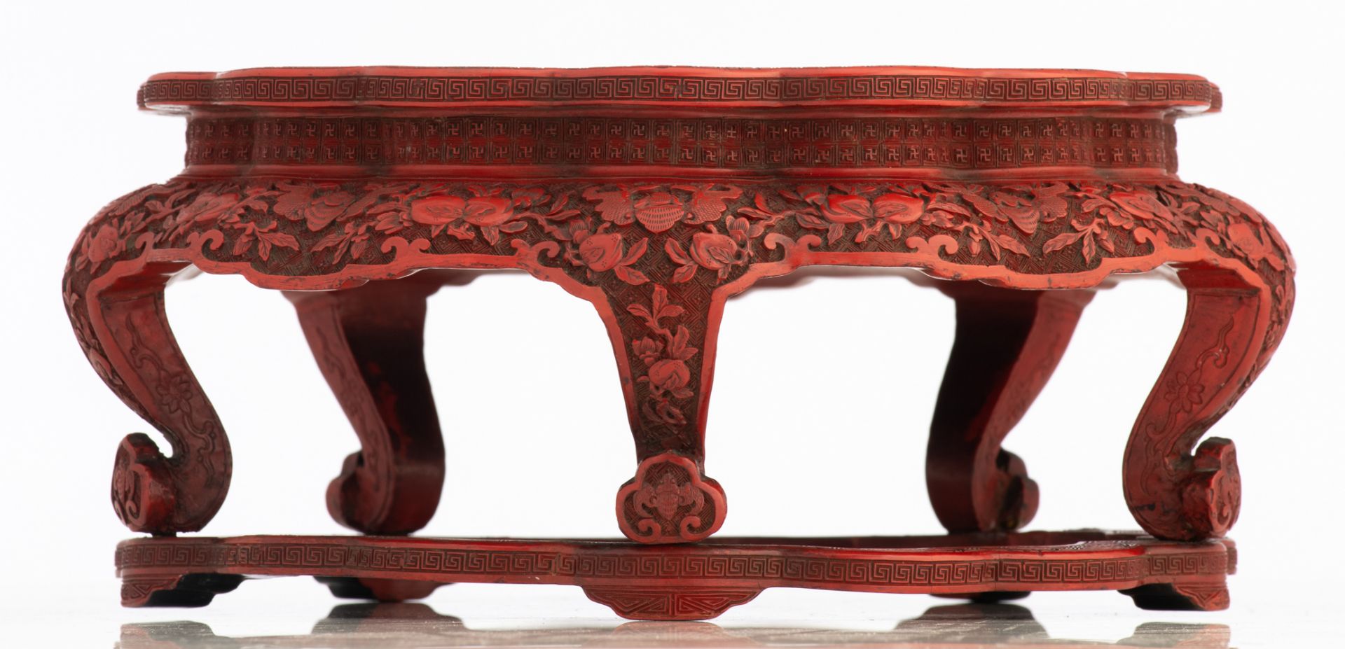 A Chinese red cinnabar lacquered stand with lobed top, the legs ruyi shaped, 18th / 19thC, - Image 2 of 7