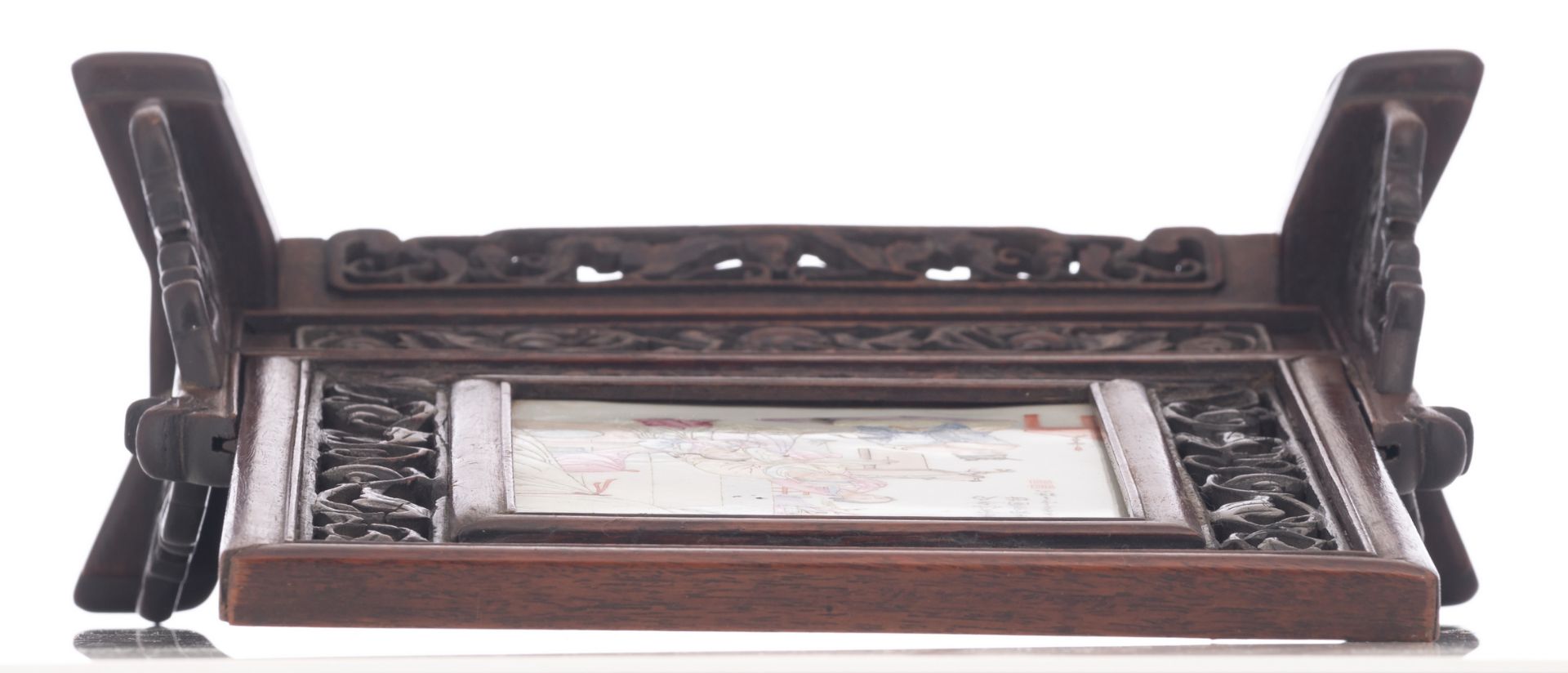 A Chinese carved wooden table screen, the plaque famille rose decorated with an animated scene, - Image 6 of 7