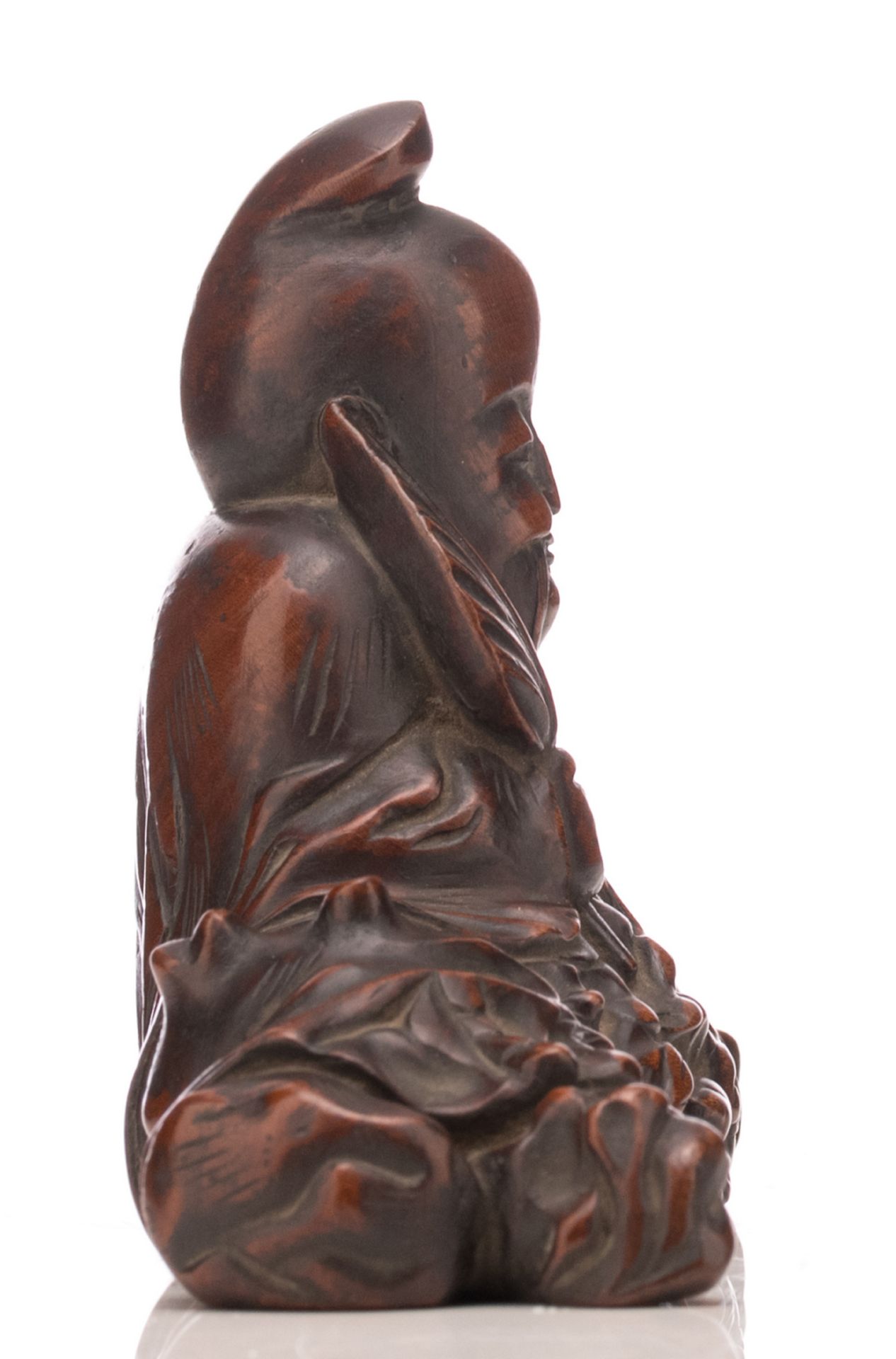 A fine Chinese carved wooden figure, depicting a lying deity, H 11 - W 17 cm - Image 4 of 6