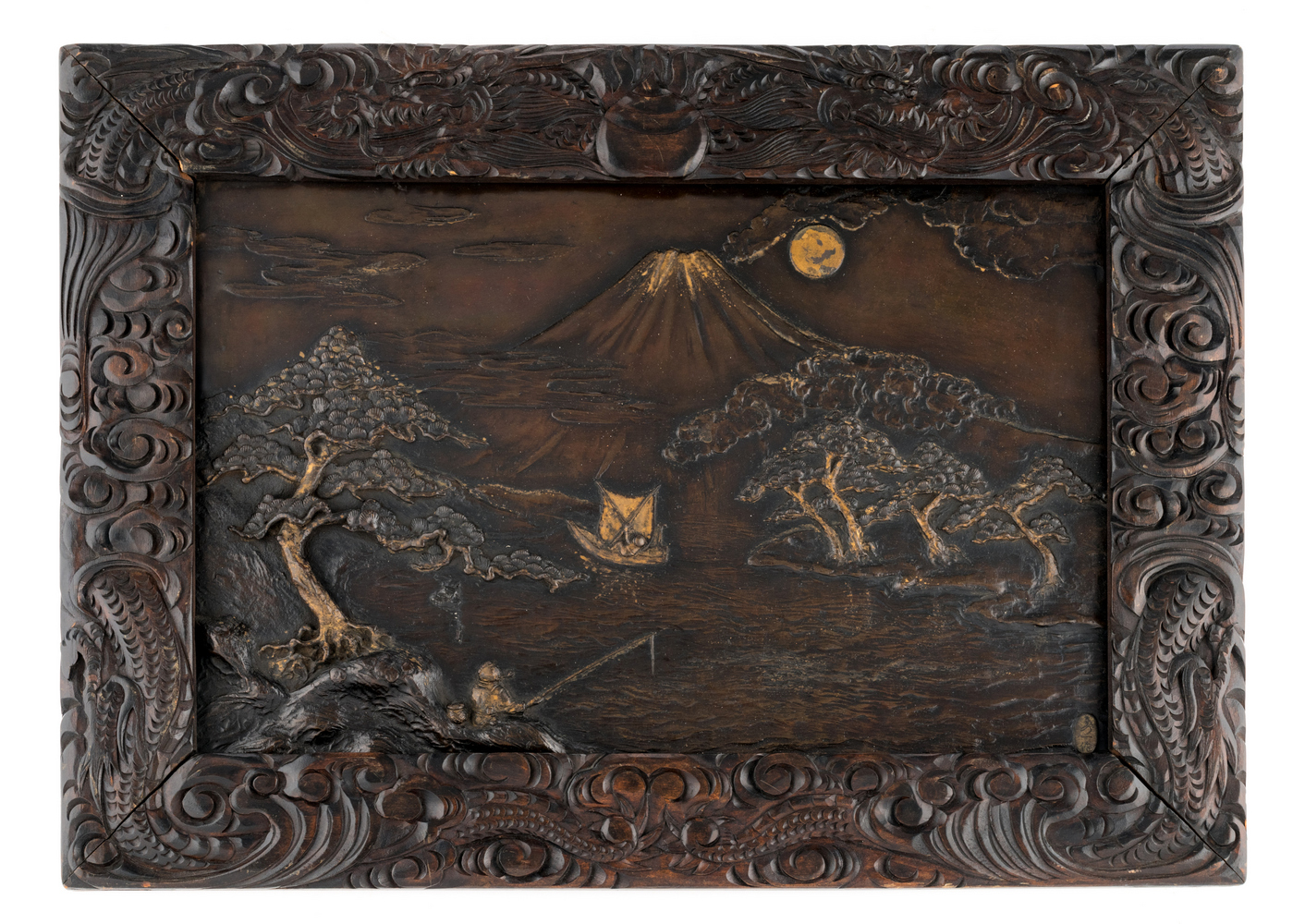A Japanese alto relievo patinated bronze plaque, depicting fishermen with mount Fuji on the