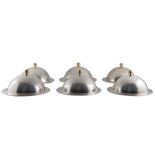 A collection of six silver plated underplates and six silver plated accompanying domes, Alessi, H 13