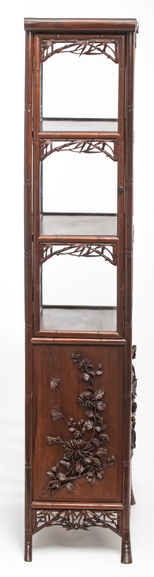 An Oriental richly carved hardwood display cabinet with bamboo imitation, the panels decorated - Image 5 of 6