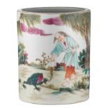 A Chinese famille rose brush pot, decorated with Liu Hai and the three legged toad in a garden, with