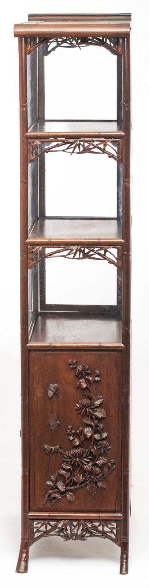 An Oriental richly carved hardwood display cabinet with bamboo imitation, the panels decorated - Image 3 of 6