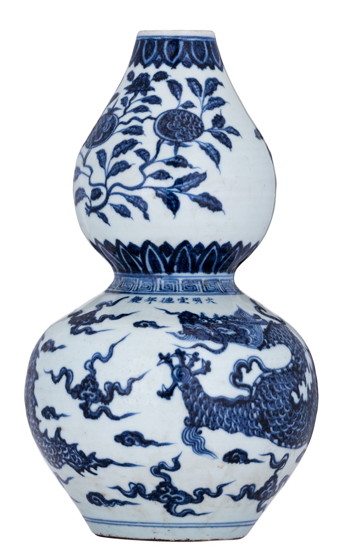 A Chinese celadon ground blue and white dragon decorated double gourd vase, with a Xuande mark, H 36