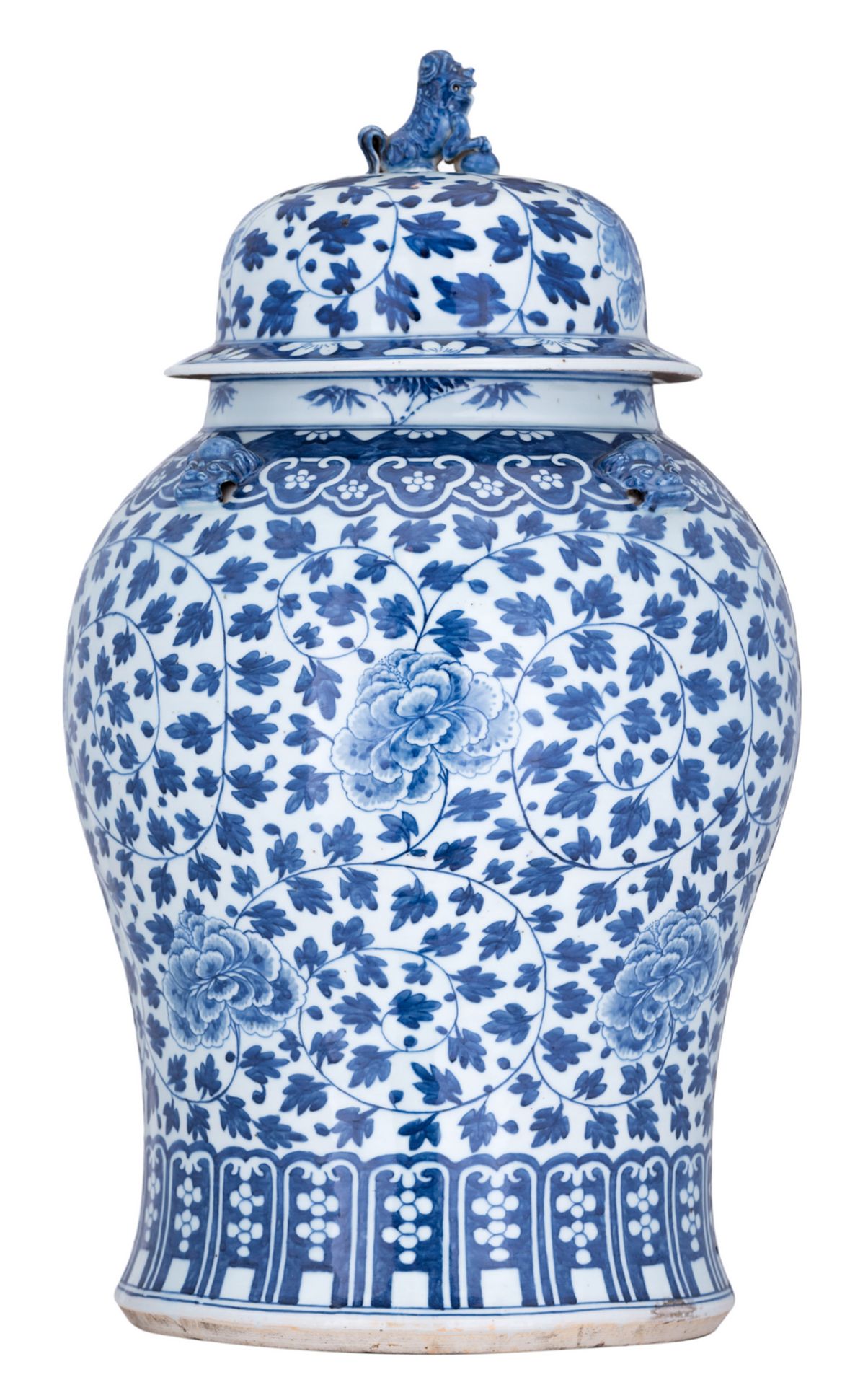 A large Chinese blue and white Kangxi vase and cover, decorated with scrolling peonies and bamboo,