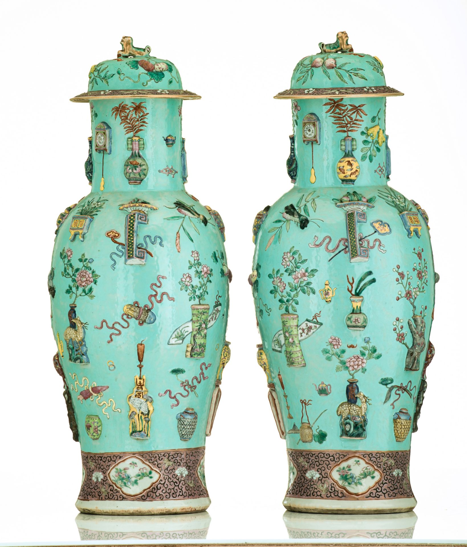 A fine pair of Chinese turquoise ground famille rose vases and covers, relief moulded with - Bild 3 aus 6