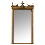 A neorenaissance mirror, gilt and imitation wood decorated, 111 x 225 cm