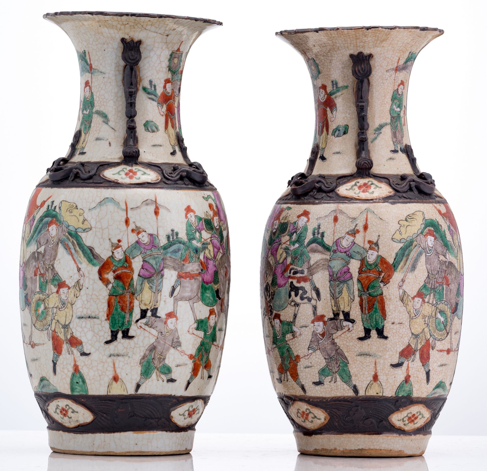 A pair of Chinese polychrome stoneware vases, overall decorated with warriors, marked, about 1900, H - Bild 4 aus 6