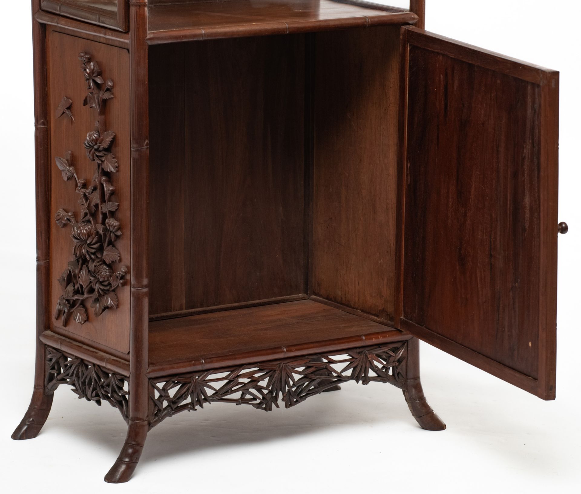 An Oriental richly carved hardwood display cabinet with bamboo imitation, the panels decorated - Image 6 of 6
