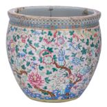 A fine Chinese pink ground famille rose fish bowl, decorated with fruits and boys amongst flower