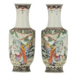 A fine pair of Chinese famille rose vases, overall decorated with a horseman and a warrior in a