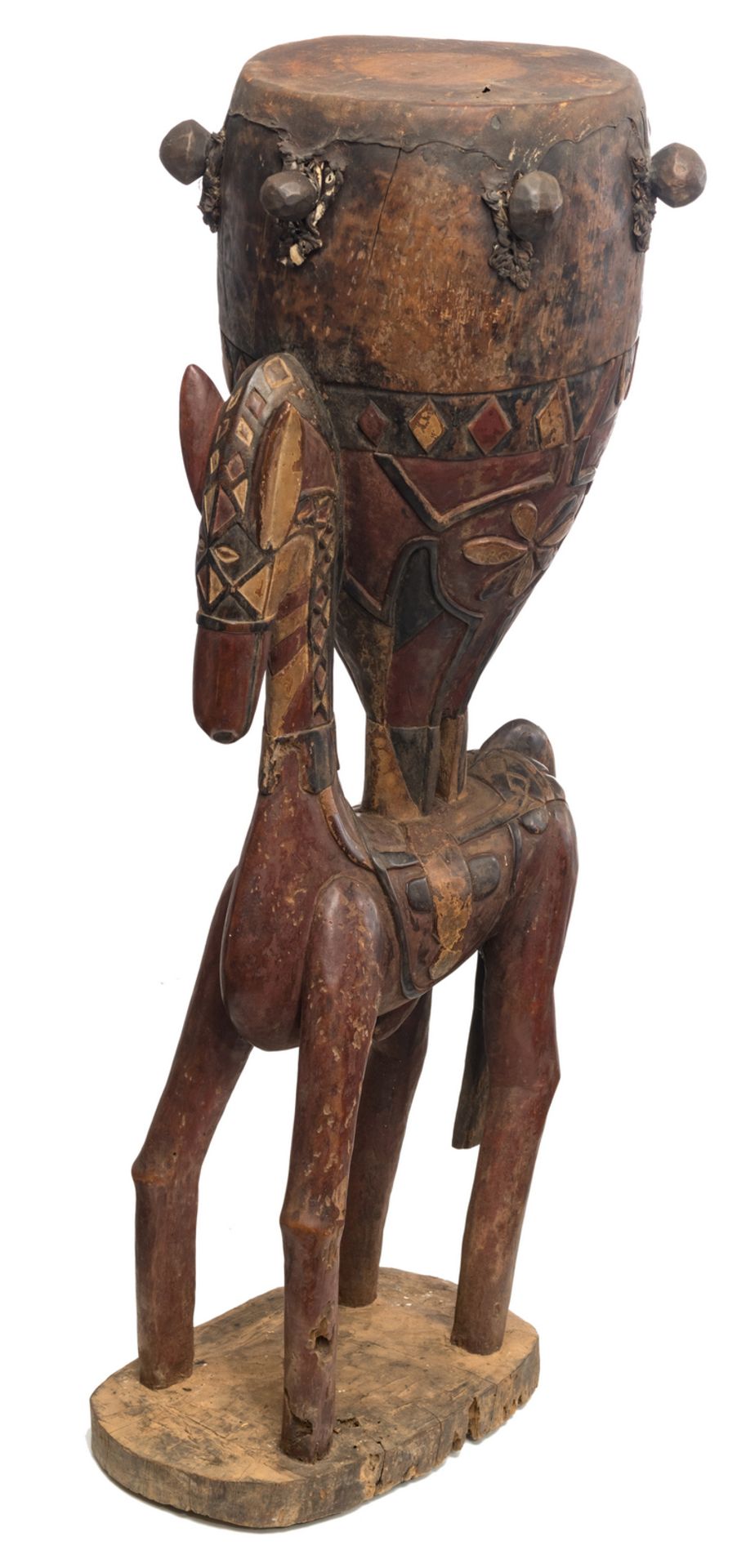 A wood and polychrome Baga drum on a horse shaped base, Guinea Bissau, possibly first half 20thC,