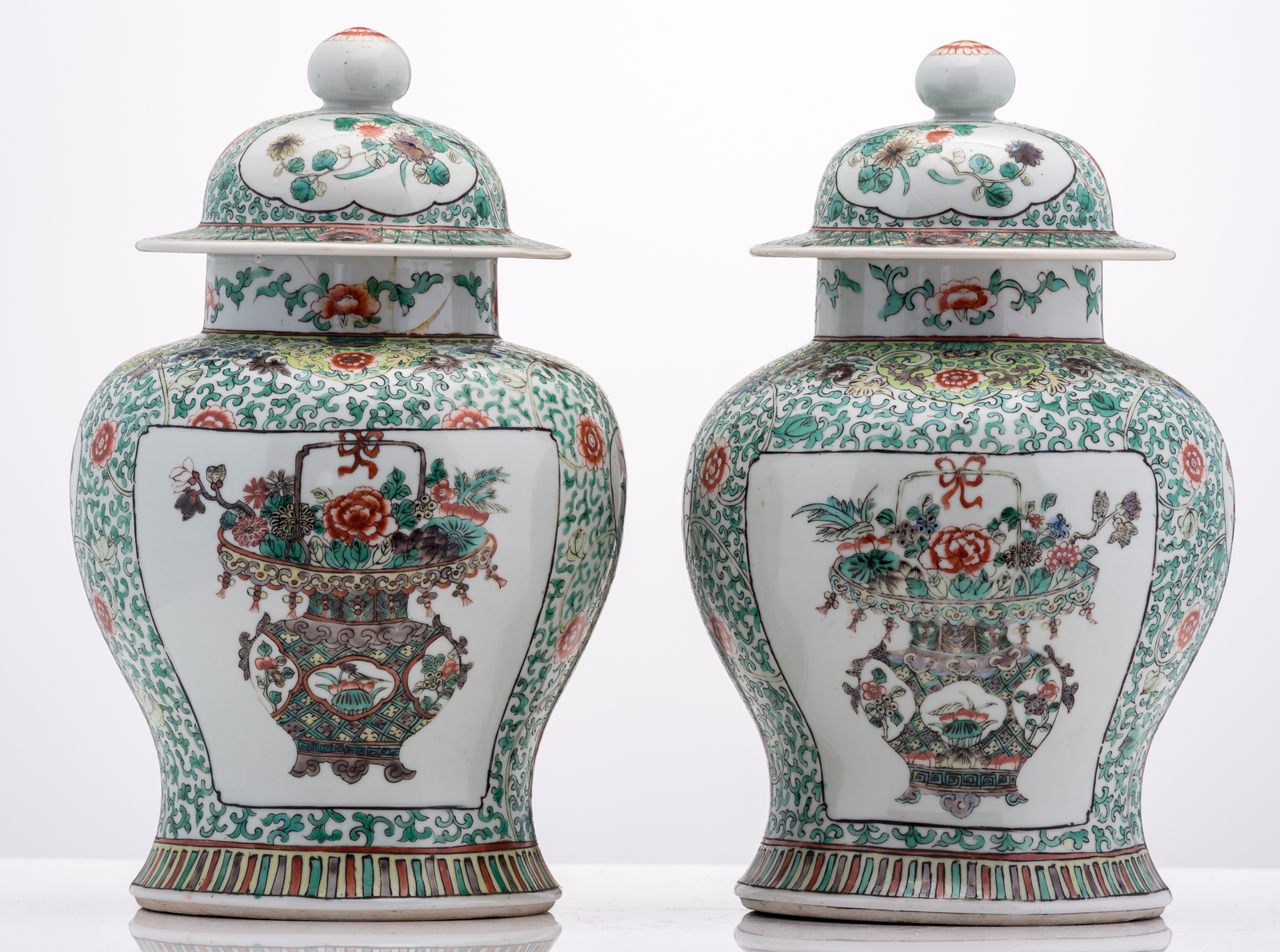 A pair of Chinese famille verte floral decorated vases and covers, the roundels with flower baskets, - Image 3 of 6