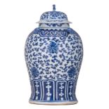 A Chinese blue and white vase and cover, decorated with scrolling lotus, H 46 cm
