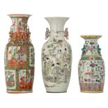 Two Chinese famille rose vases, decorated with a gallant garden scene, flower branches and