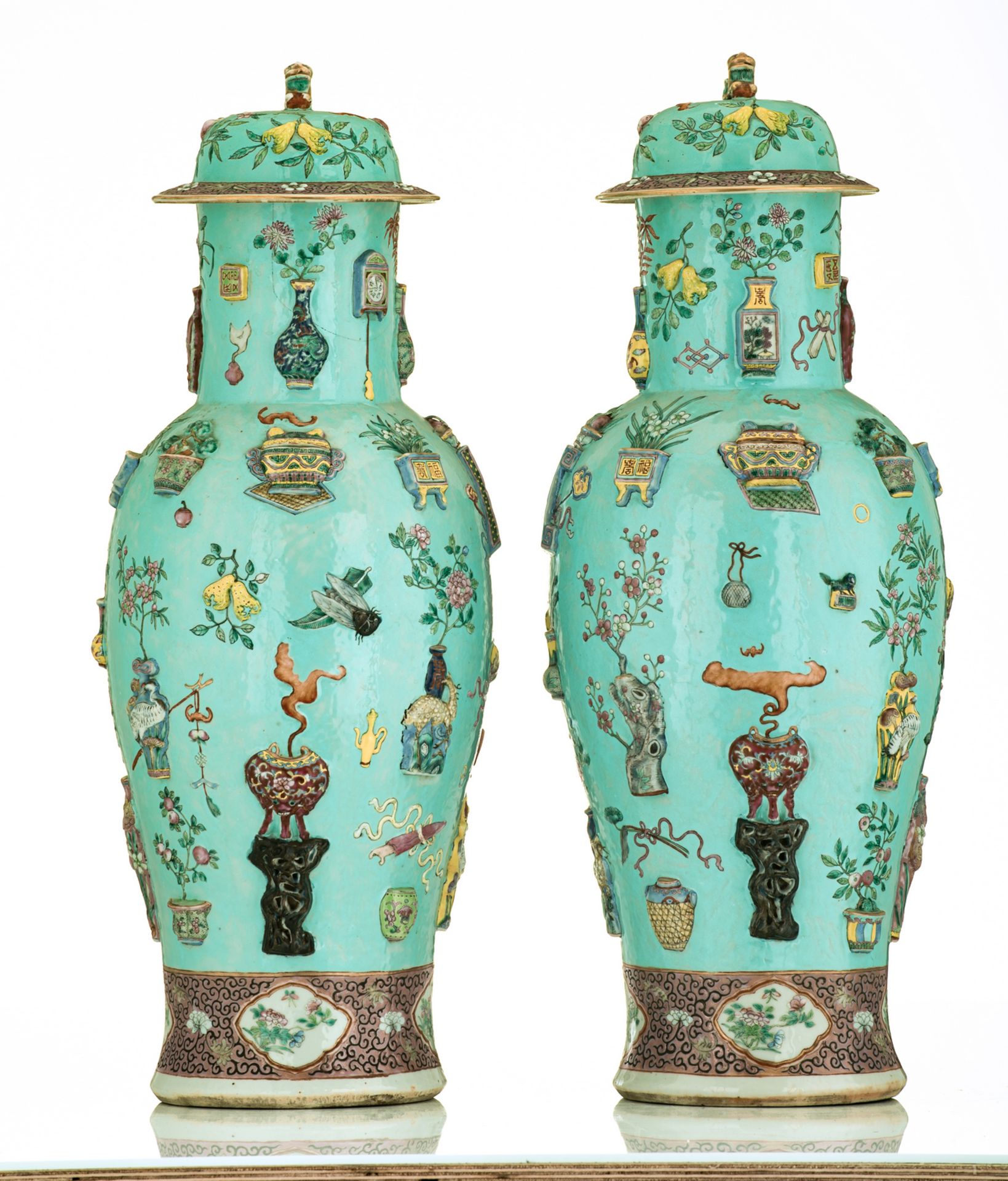 A fine pair of Chinese turquoise ground famille rose vases and covers, relief moulded with - Bild 4 aus 6