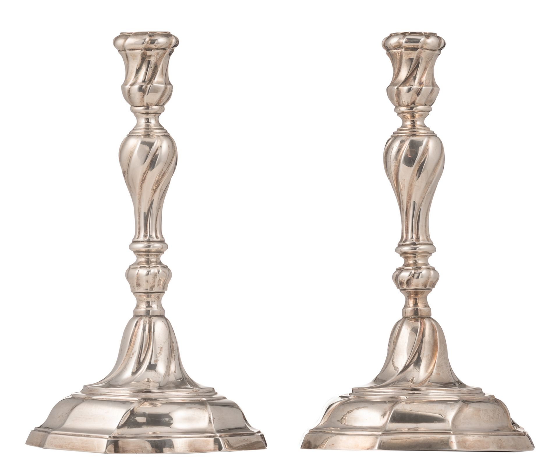 A pair of silver rococo candlesticks, Ghent hallmark, date letter (17)75, maker's mark J.B. Ms
