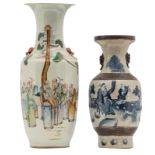 A Chinese polychrome vase, decorated with literati and calligraphic texts; added a Chinese blue