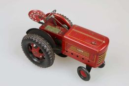 Blechspielzeug Traktor um 1920, Blech rot lithographiert, bez. A-L. Federantrieb mit lenkbaren