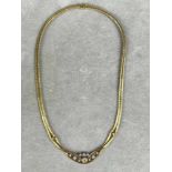 COLLIER mit BRILLANT-BESATZ, 750er Gelbgold, Gewicht ca. 30,8 g. Länge: ca. 42 cm. Aus zwei Strängen