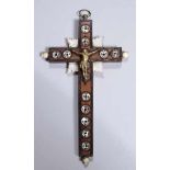 Wand-Kreuz, 19. Jh., kleines, schlichtes Holzkreuz mit runden, beschrifteten, gelochten