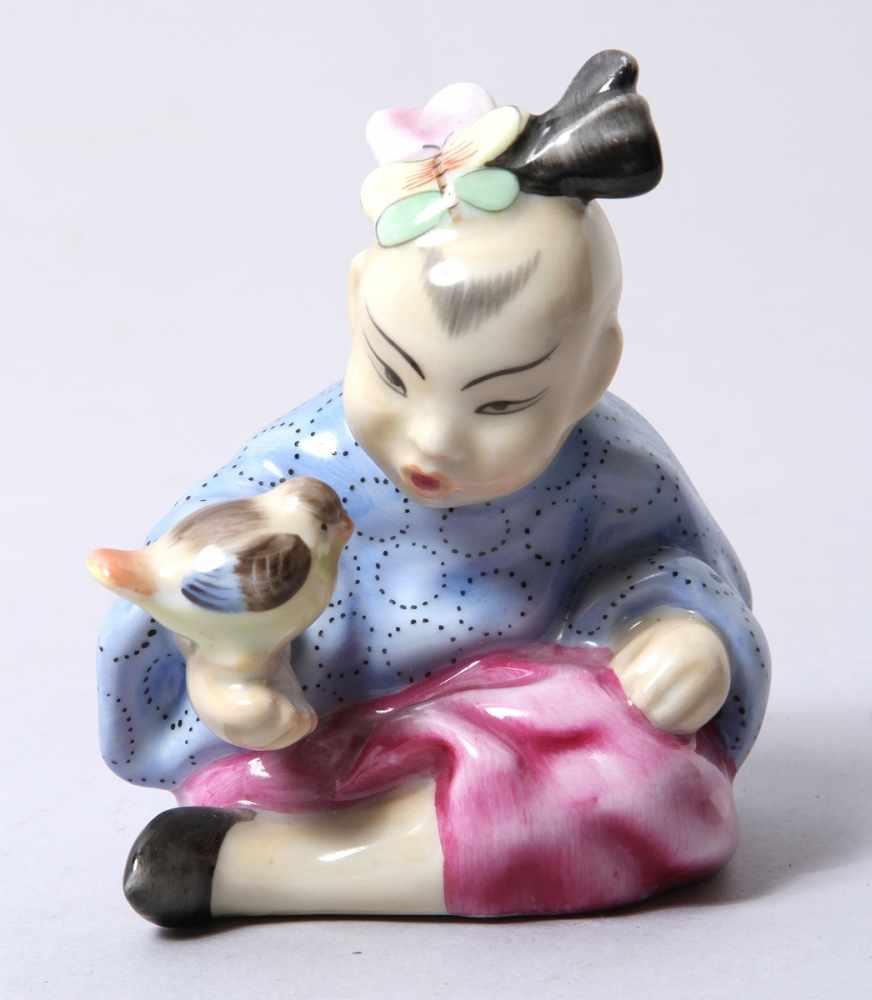 Porzellan-Figur, "Asiatisches Kind", Herend, 2. Hälfte 20. Jh., vollplastische, auf Boden sitzende