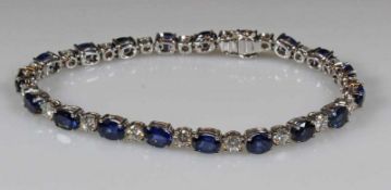 Armband, WG 750, 19 oval facettierte Saphire, 19 Brillanten zus. ca. 1.90 ct., 17.5 cm lang, 13 g