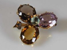 Brosche, "Blüte", Ende 19. Jh., Fassung GG 585, Broschierung Metall, Amethyst, Citrin, Rauchtopas,