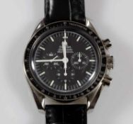 Herrenarmbanduhr, Omega, Modell Speedmaster Professionel, Ref.-Nr. 038705031, Serien-Nr. 77751530,