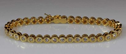 Armband, GG 750, 38 Brillanten zus. ca. 2.70 ct., etwa fw-w/vvs-vs, Goldgewicht ca. 18.6 g 20.00 %